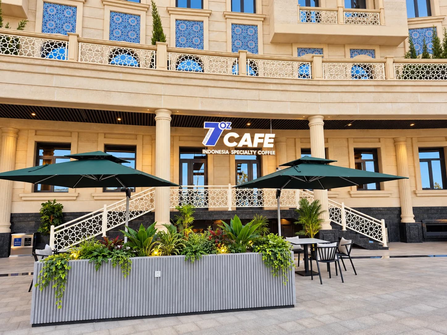 7oz Espresso entrance and terrace with teal parasols, café seating, and planters.